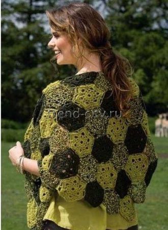 Crochet Shawl from Motifs - woman wearing green motif shawl