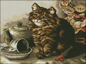 Котенок на столе